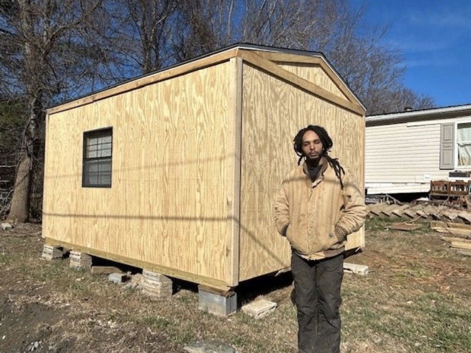 <i>WLOS via CNN Newsource</i><br/>A team of volunteers for weeks have been working on building 12-feet by 16-feet cabins. Orlondo Morris is a recipient of one of the units on his grandmother’s property.