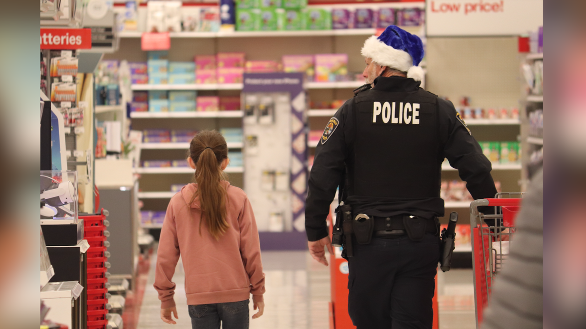 30 to 40 kids got to buy presents for their families with help from law enforcement