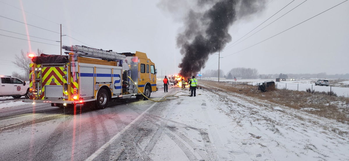 A catches fire after an accident on US 20 near the Thornton exit on Monday, Dec. 16, 2024. 