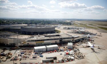 The passenger has been detained at Charles de Gaulle Airport for several days.