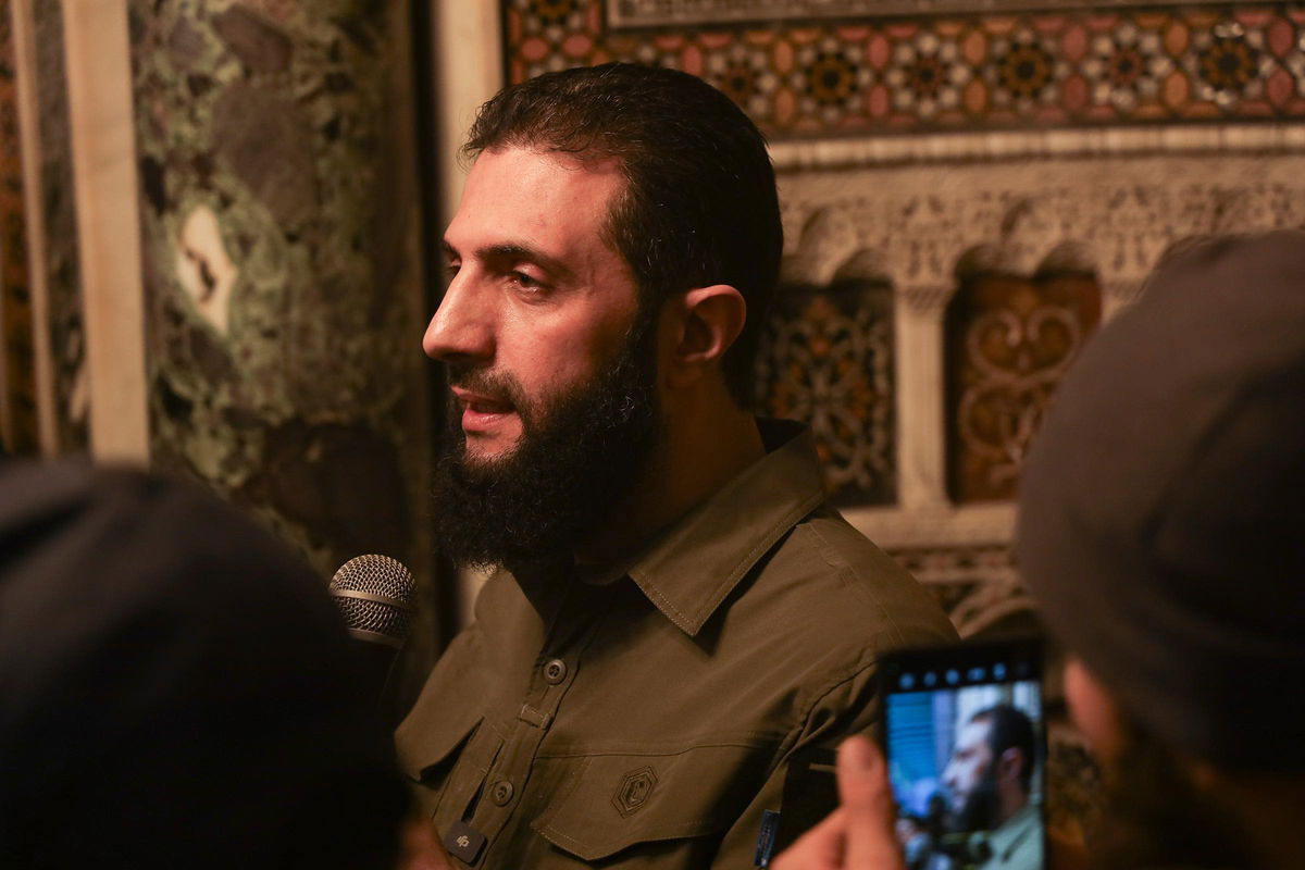 <i>Omar Albam/AP via CNN Newsource</i><br/>Ahmad al-Sharaa speaks at the Umayyad Mosque in Damascus on December 8.