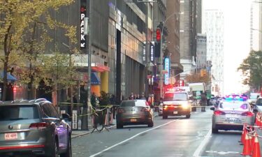 Police work the scene of a shooting