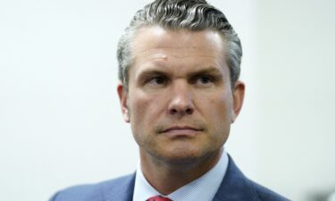 Pete Hegseth leaves a meeting with U.S. Sen. Joni Ernst (R-IA) at the U.S. Capitol on December 4 in Washington