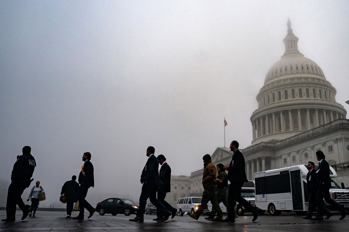 <i>Kent Nishimura/Getty Images via CNN Newsource</i><br/>Fog hovers over the dome of the US Capitol on December 10