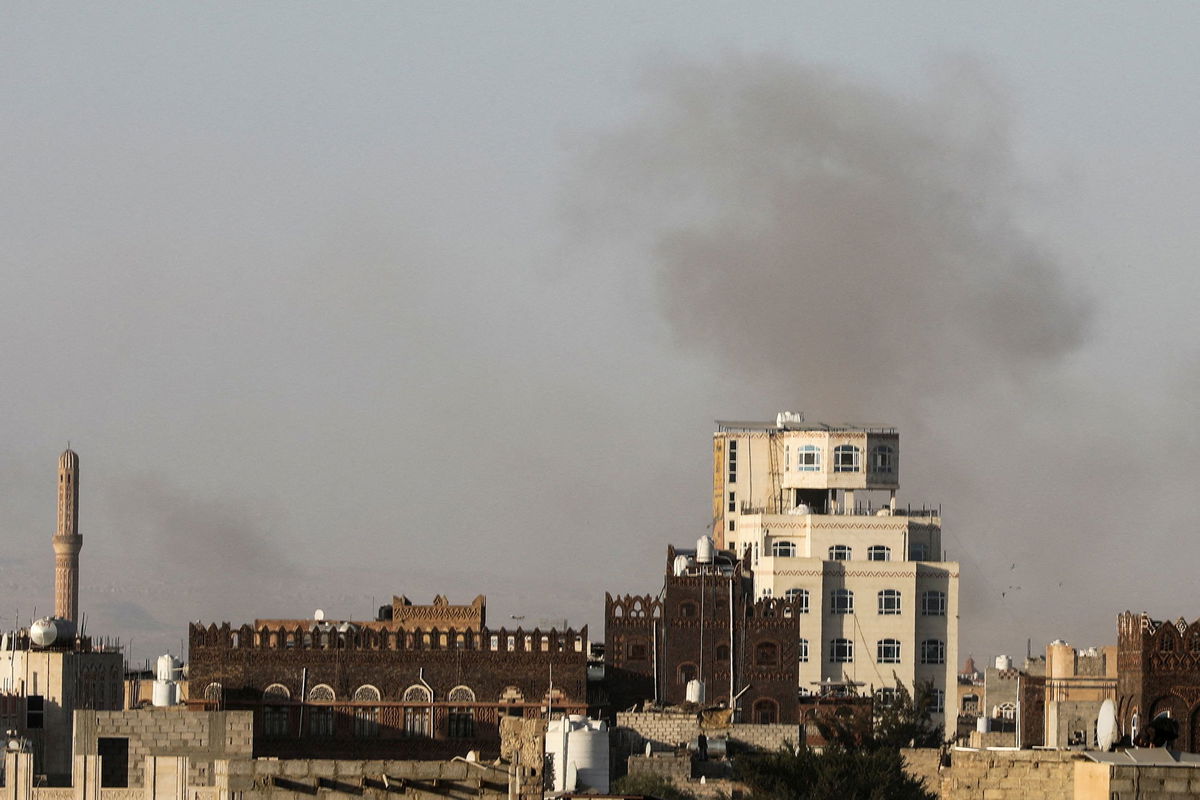 <i>Khaled Abdullah/Reuters via CNN Newsource</i><br/>Smoke rises near Sana'a International Airport