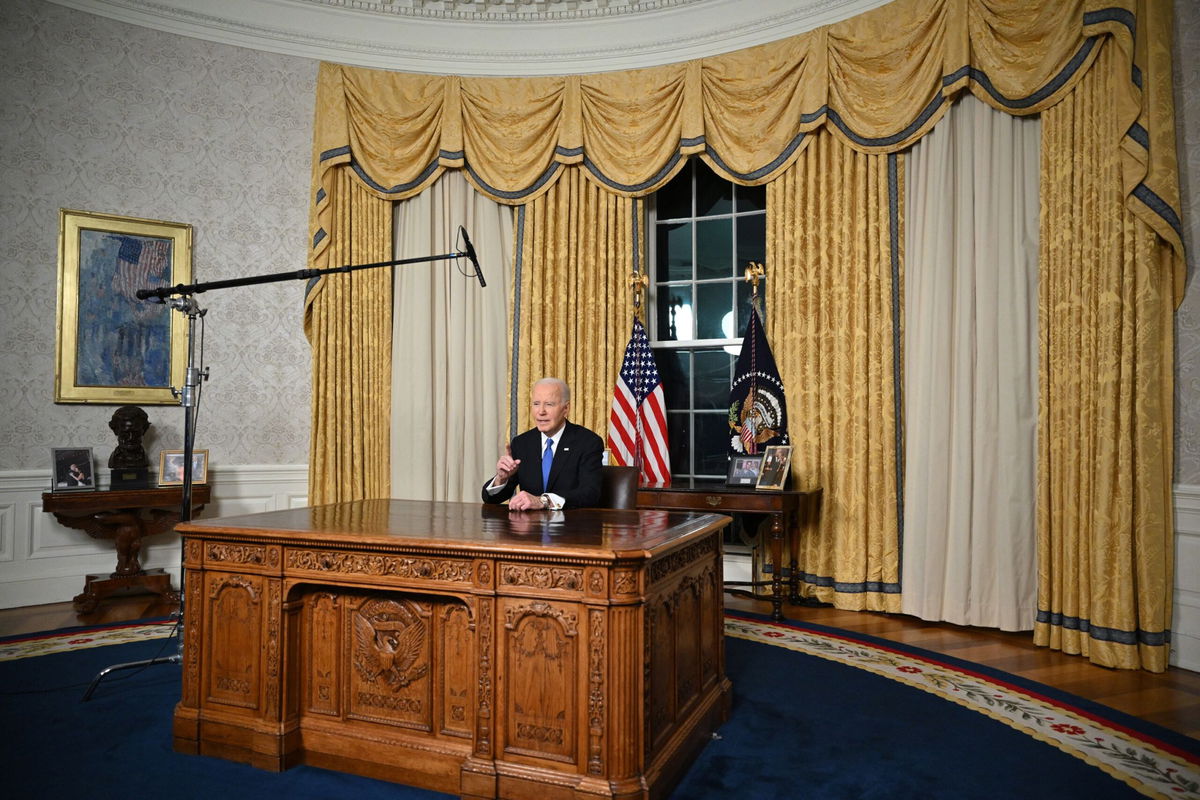 US President Joe Biden delivers his farewell address to the nation from the Oval Office of the White House in Washington.