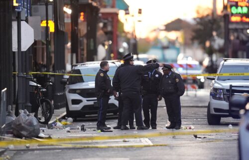 Emergency services attend the scene on Bourbon Street after a vehicle drove into a crowd on New Orleans' Canal and Bourbon Street on January 1.