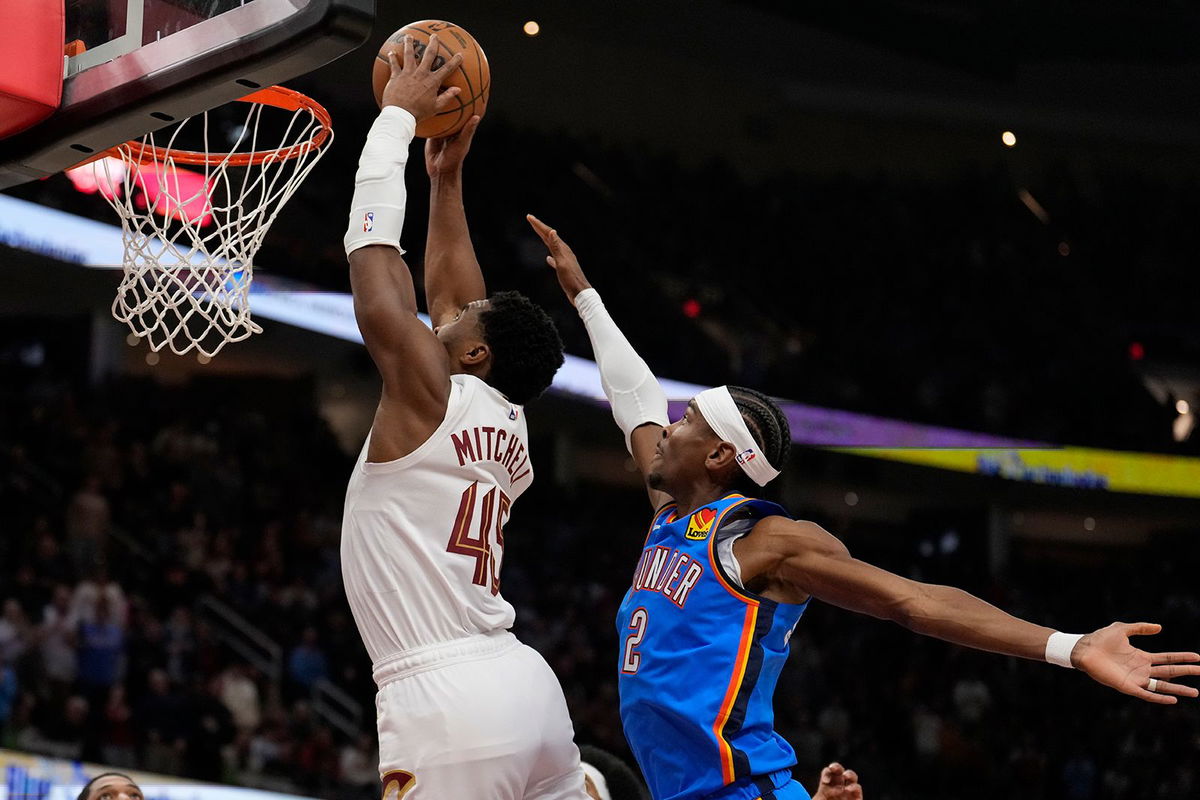 <i>Sue Ogrocki/AP via CNN Newsource</i><br/>Cleveland Cavaliers guard Donovan Mitchell goes up for a dunk in front of Oklahoma City Thunder guard Shai Gilgeous-Alexander.