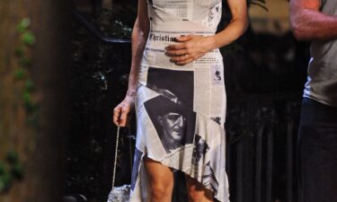The Christian Dior newspaper-print slip dress from John Galliano's "Fly Girl" collection fall-winter 2000