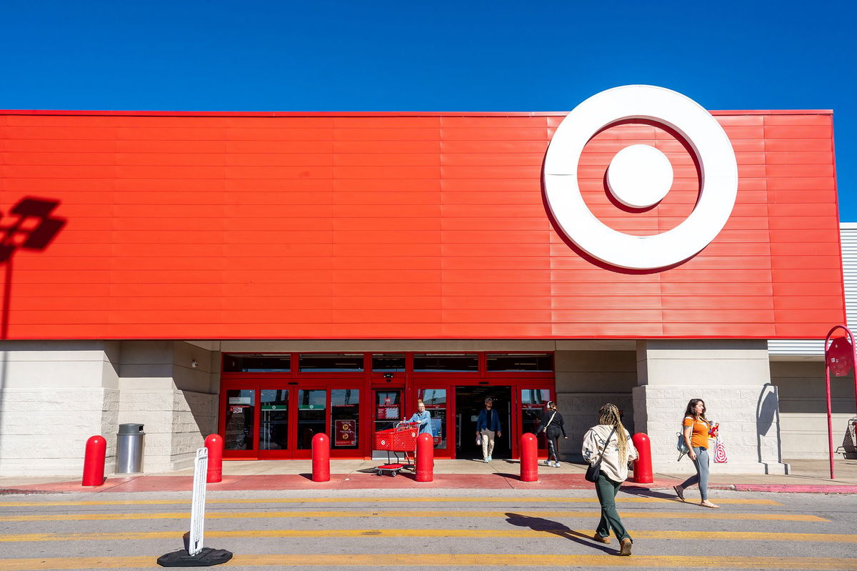 <i>Brandon Bell/Getty Images via CNN Newsource</i><br/>Customers enter and exit a Target store in November 2024 in Austin