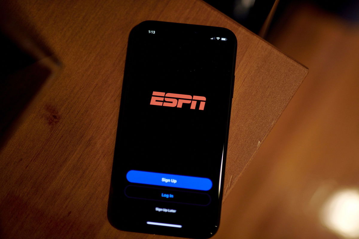 <i>Gabby Jones/Bloomberg/Getty Images via CNN Newsource</i><br/>The ESPN login screen on a smartphone in the Brooklyn borough of New York in July 2022.