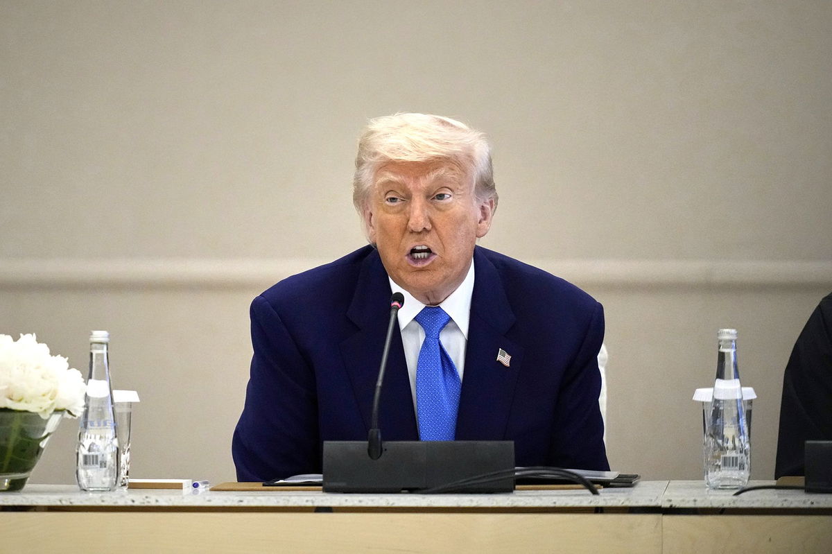<i>Altaf Qadri/AP via CNN Newsource</i><br/>President Donald Trump attends a business meeting and roundtable at Qasr Al Watan in Abu Dhabi