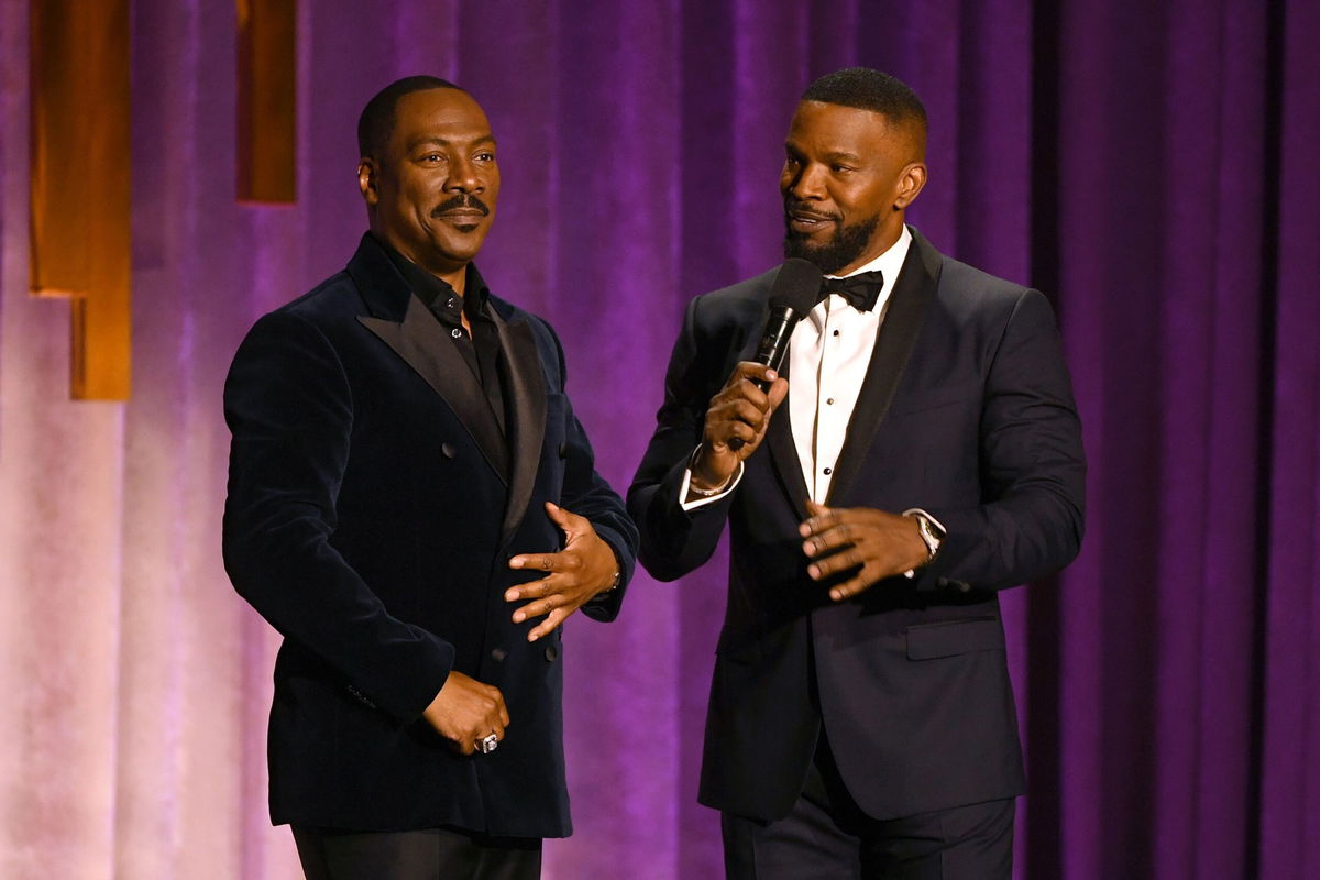 <i>Kevin Winter/Getty Images via CNN Newsource</i><br/>Eddie Murphy and Jamie Foxx speak onstage during the Academy Of Motion Picture Arts And Sciences' 11th Annual Governors Awards at The Ray Dolby Ballroom at Hollywood & Highland Center in October 2019 in Hollywood