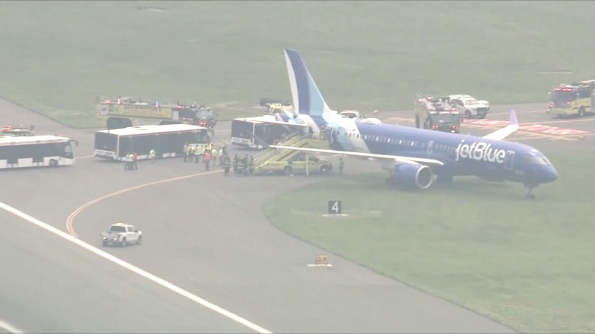 <i>WCVB via CNN Newsource</i><br/>A jetBlue plane is seen off the runway at Boston Logan International Airport on June 12