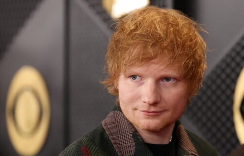 Ed Sheeran poses on the red carpet as he attends the 66th Annual Grammy Awards in Los Angeles