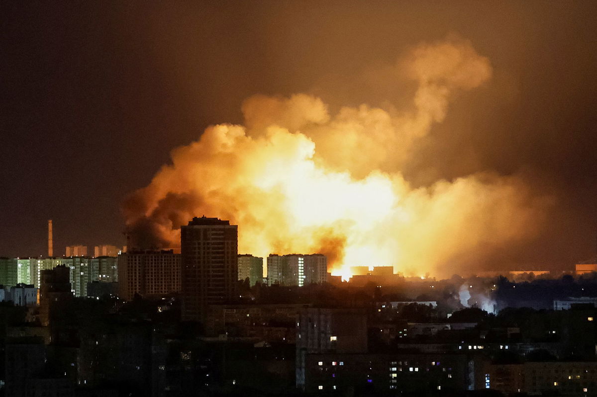 <i>Anatolii Stepanov/Reuters via CNN Newsource</i><br/>A resident stands near buildings damaged by Russian military strikes in the front line town of Myrnohrad