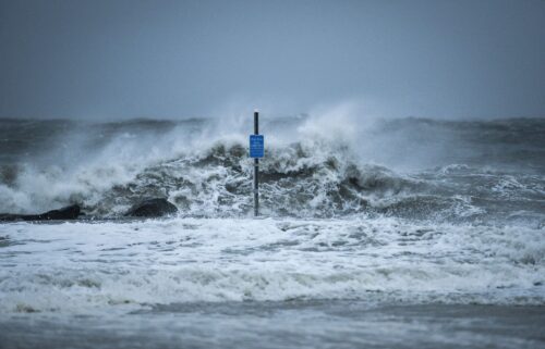 Waves crash on the beach in January 2016