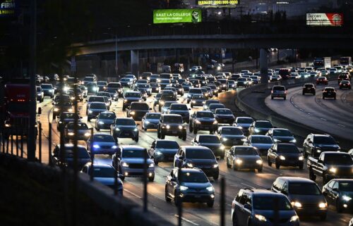 Cars make their way heading east out of Los Angeles during the evening rush hour in January 2024.