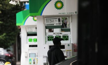 A person pumps gas at a BP gas station in June 2023 in Brooklyn.