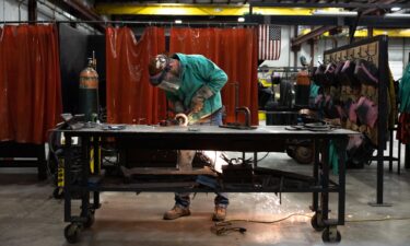 A student does steel work during an apprenticeship in Dayton